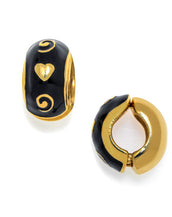 Black w/Gold Motif Reversible Hugs® Clip Earrings