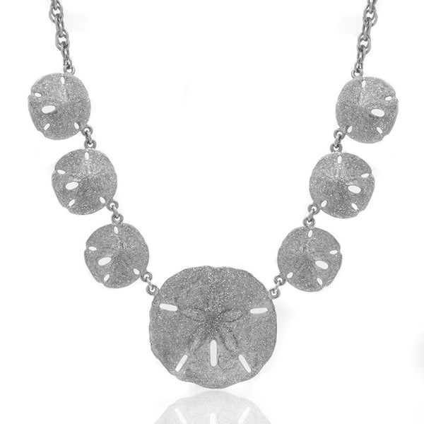 Silvertone Stardust Sand Dollar necklace