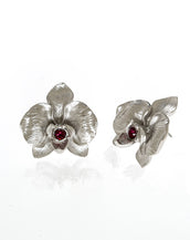 Orchid Silvertone Earring With Ruby Center